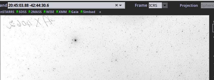Black dots on a white-ish background.  In the middle, some diffuse greyish stuff around a relatively large black dot.
