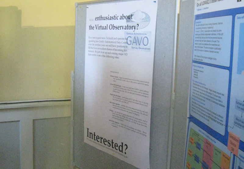 The end of a poster wall; there is a simple poster with large text: „Enthusiastic about the VO?  Interested?“ and a lot of small print.
